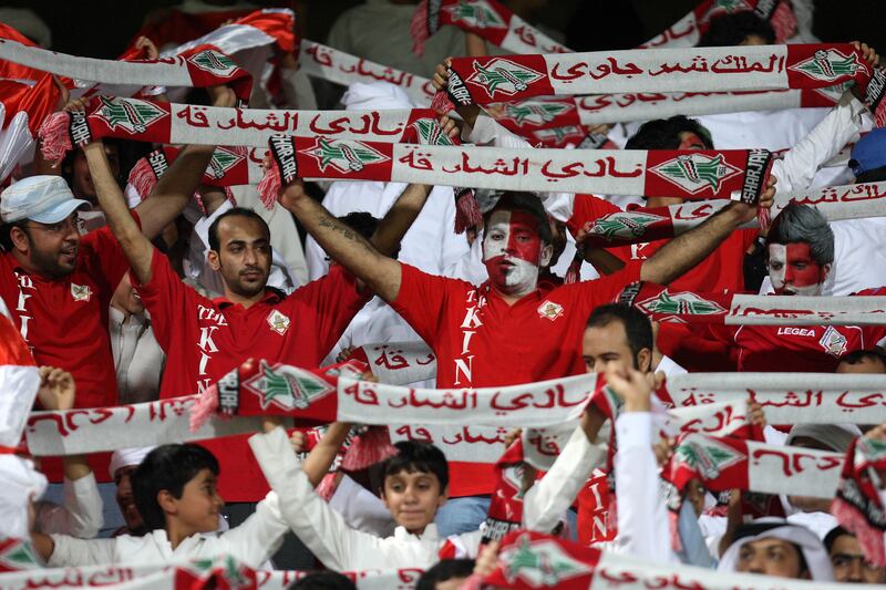 DUBAI , UNITED ARAB EMIRATES Ð Sep 14 :  Supporters of Sharjah during the Pro League round robin tournament football match between Sharjah vs Emirates at Al Shabab stadium in Dubai. ( Pawan Singh / The National ) For Sports. Story by Ahmed