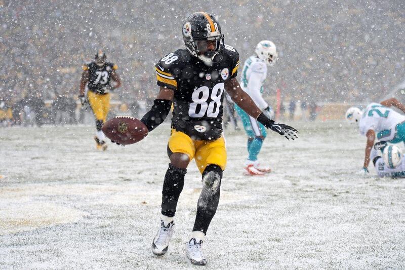 Emmanuel Sanders catches a touchdown for the Pittsburgh. The Steelers would go on to lose to the Miami Dolphins 34-28, though. Don Wright / AP