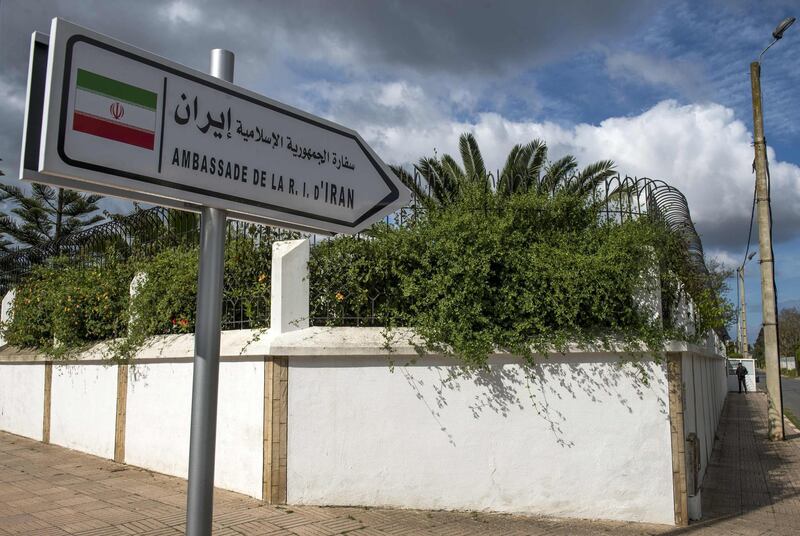 A sign indicating the way to the embassy of Iran in Rabat is seen on May 2, 2018.
Iran today denied that it was involved in a weapons delivery to the Polisario Front movement seeking independence for Western Sahara, after Morocco cut diplomatic ties with Tehran over the allegations. Morocco, which has close relations with Iran's regional rival Saudi Arabia, on Tuesday accused Tehran of using its Lebanese militia ally Hezbollah to deliver weapons to the Polisario Front.
 / AFP PHOTO / FADEL SENNA