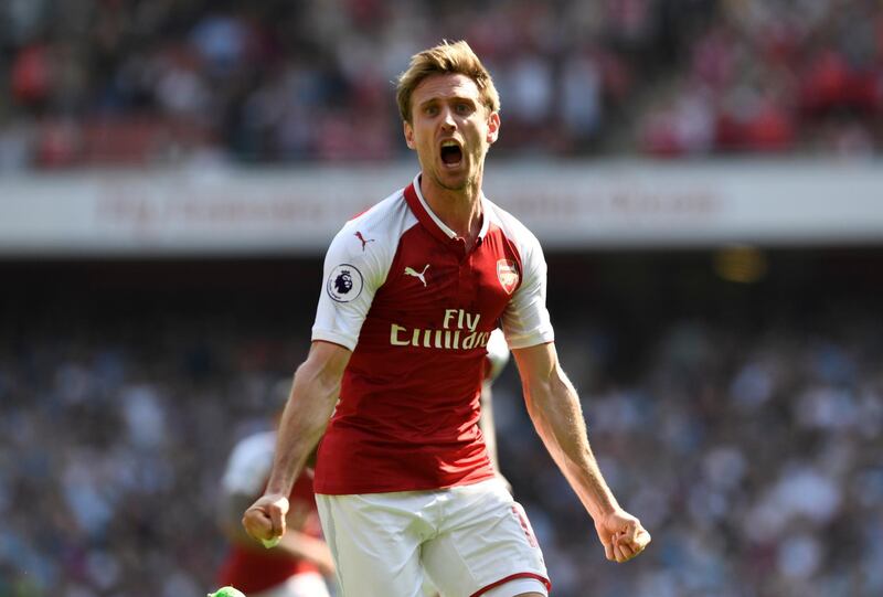 Left-back: Nacho Monreal (Arsenal) – Opened the scoring with a rare volleyed goal as Arsenal began Arsene Wenger’s long goodbye with a 4-1 win over West Ham. Tony O'Brien / Reuters