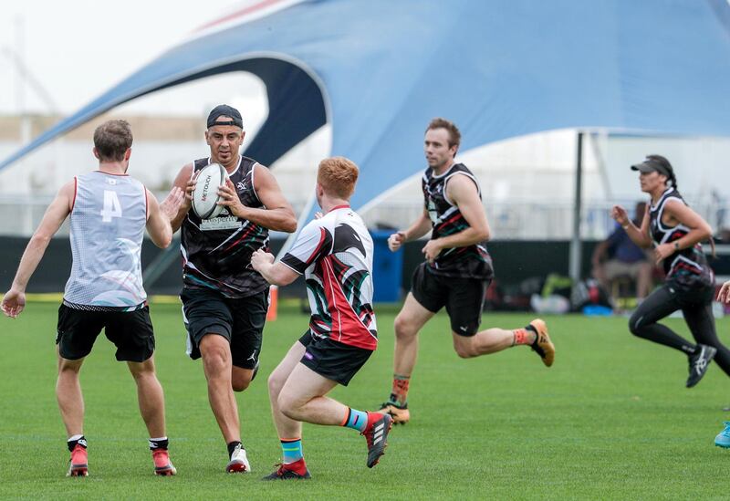 Abu Dhabi, April 13, 2019.  Middle East Touch preparing to play at the World Cup of rugby's non-contact version.  -- John Larkins in action. 
Victor Besa/The National.
Section:  SP  
Reporter:  Paul Radley