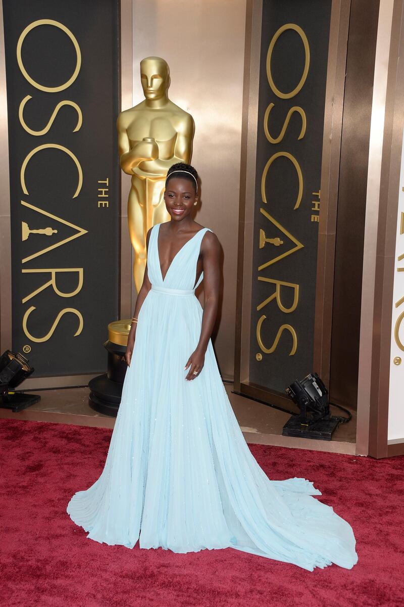 epa04107375 Kenyan actress Lupita Nyong'o arrives for the 86th annual Academy Awards ceremony at the Dolby Theatre in Hollywood, California, USA, 02 March 2014. The Oscars are presented for outstanding individual or collective efforts in up to 24 categories in filmmaking.  EPA/MIKE NELSON