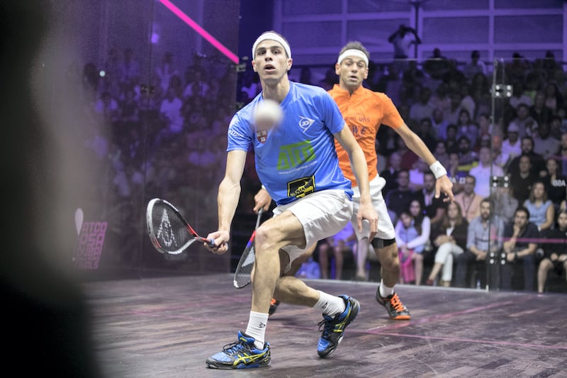 DUBAI, UNITED ARAB EMIRATES - JUNE 10, 2018. 

Egypt's Mohamed ElShorbagy, orange, has defended his crown after coming back from a game down to beat compatriot and World No.2 Ali Farag, blue, to complete a thrilling day of final action in Dubai.

The finals of the ATCO PSA Dubai World Series Finals today saw the world’s top four players in two all-Egyptian battles.

In the women's match, Egypt’s World No.1 Nour El Sherbini, has taken the honors in the women’s ATCO PSA Dubai World Series Finals after overcoming compatriot Raneem El Welily, by a 3-1 margin inside Emirates Golf Club.

(Photo by Reem Mohammed/The National)

Reporter: Amith Pasath
Section: SP
