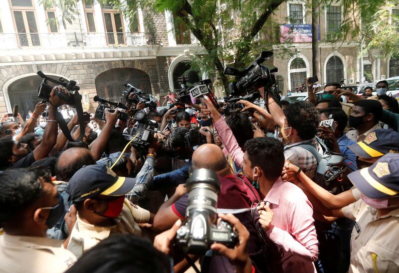 FILE PHOTO: Media personnel surround Bollywood actor Rhea Chakraborty as she arrives at Narcotics Control Bureau (NCB) office for questioning, following the death of her boyfriend and actor Sushant Singh Rajput, in Mumbai, India, September 6, 2020. Picture taken September 6, 2020. REUTERS/Francis Mascarenhas/File Photo