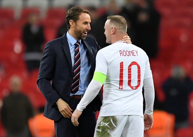 England's Wayne Rooney with manager Gareth Southgate at the end of the match. REUTERS