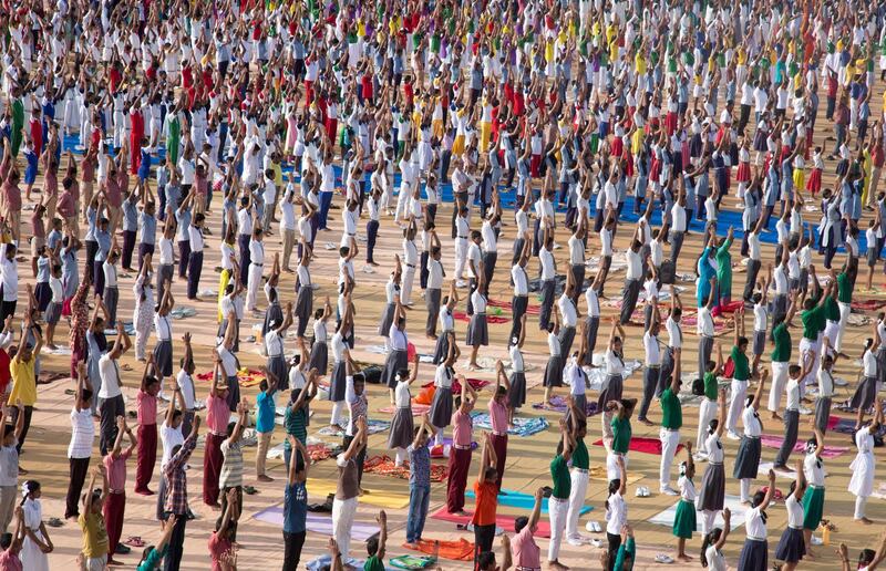 Indian students practise yoga ahead of International Yoga Day in Hyderabad, India. Mahesh Kumar A. / AP Photo