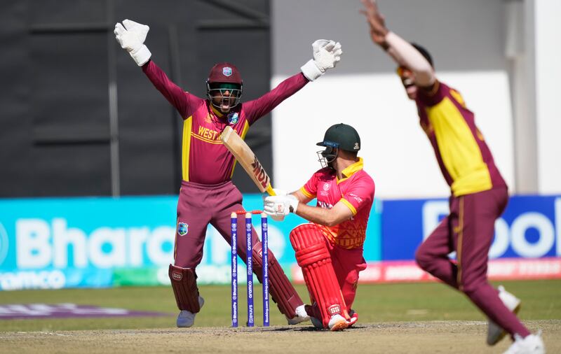 West Indies players appeal for the wicket of Zimbabwe batsman Ryan Burl. AP
