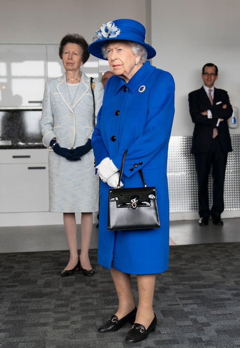 Queen Elizabeth II, in blue, and Anne, Princess Royal, visit Skypark in Glasgow, Scotland, on June 30, 2021. Getty Images