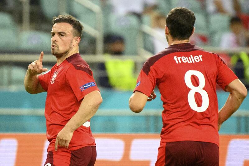 Switzerland's midfielder Xherdan Shaqiri celebrates his first goal in a 3-1 win over Turkey. EPA