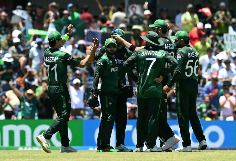 Pakistan's player celebrate dismissing USA Captain Monank Patel during their T20 World Cup match at the Grand Prairie Cricket Stadium. AFP