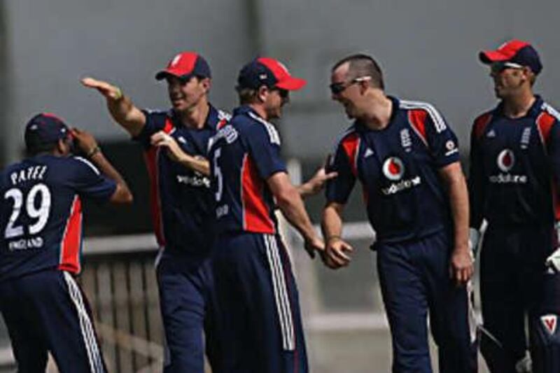 Graeme Swann, second right, has been named in the 12-man squad to face India in the third one-day international in Kanpur.