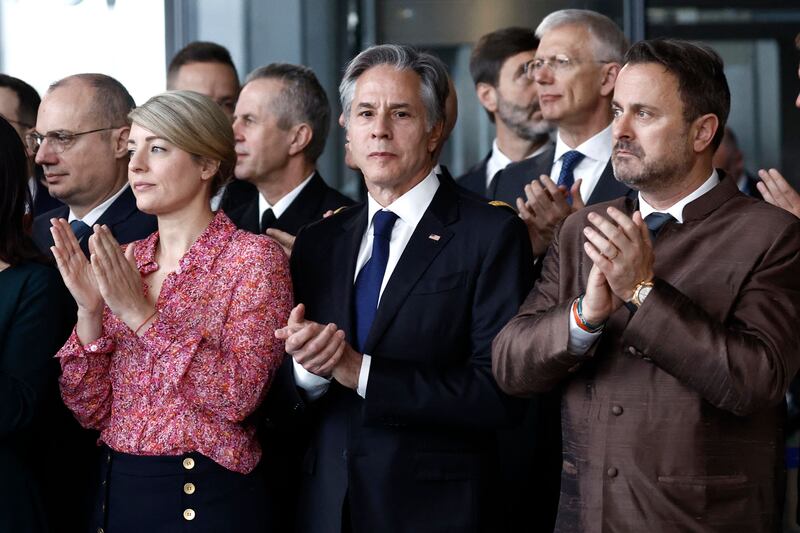Canadian Minister for Foreign Affairs Melanie Joly, US Secretary of State Antony Blinken and Luxembourg's Minister for Foreign Affairs Xavier Bettel at the ceremony. AFP