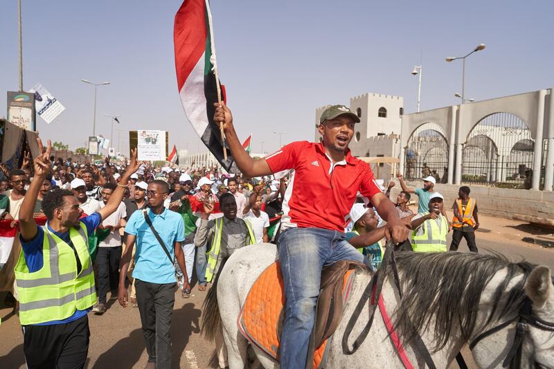 A protester on horseback arrives at the site of a sit-in. Getty Images
