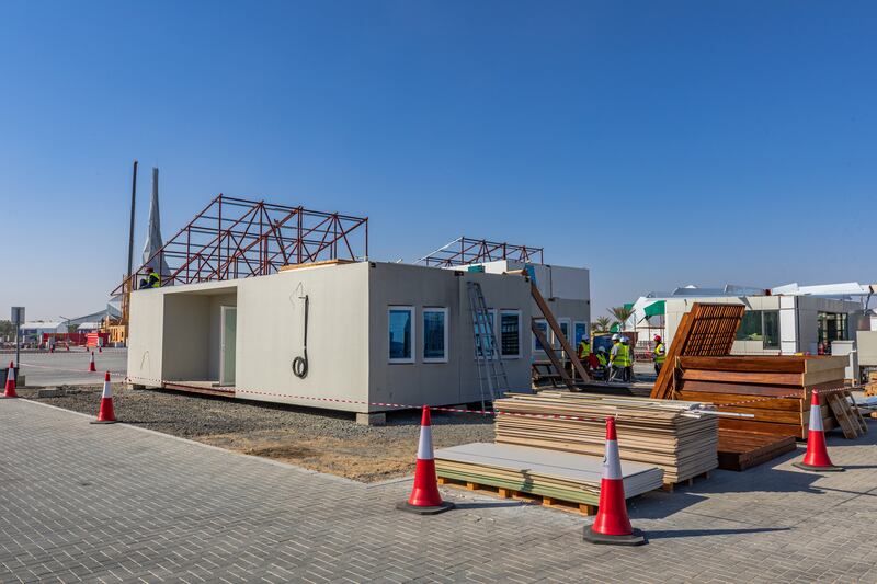 Teams from international and regional universities assemble energy efficient solar homes for the second Solar Decathlon contest to win prizes on architecture; engineering and building, sustainability and innovation at the solar park in Dubai. Photo: Dewa