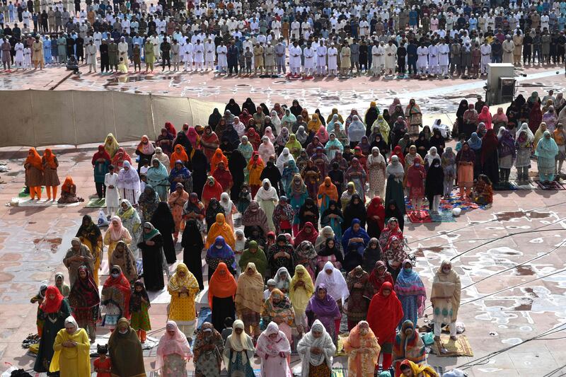 Muslims offer prayers at Badshahi Mosque in Lahore, Pakistan, for Eid Al Adha.