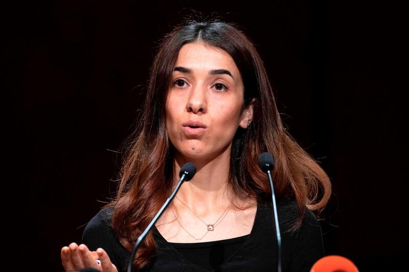 Laureate of the Nobel Peace Prize and Iraqi Yazidi Nadia Murad gives a speech during a commemoration ceremony in Stuttgart, southern Germany, on August 3, 2019. The Central Yazidi Council in Germany commemorates the 5th anniversary of the genocide of the Yazidi in August 2014 when fighters of the Islamic State (IS) killed thousands of Yazidi in Iraq. / AFP / THOMAS KIENZLE
