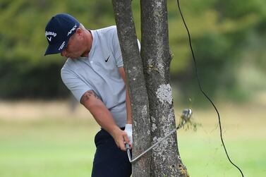 BIRMINGHAM, ENGLAND - AUGUST 01: Callum Shinkwin of England brakes his club whilst playing his second shot behind a tree on the third hole during Day three of the Hero Open at Marriott Forest of Arden on August 01, 2020 in Birmingham, England. (Photo by Ross Kinnaird/Getty Images)