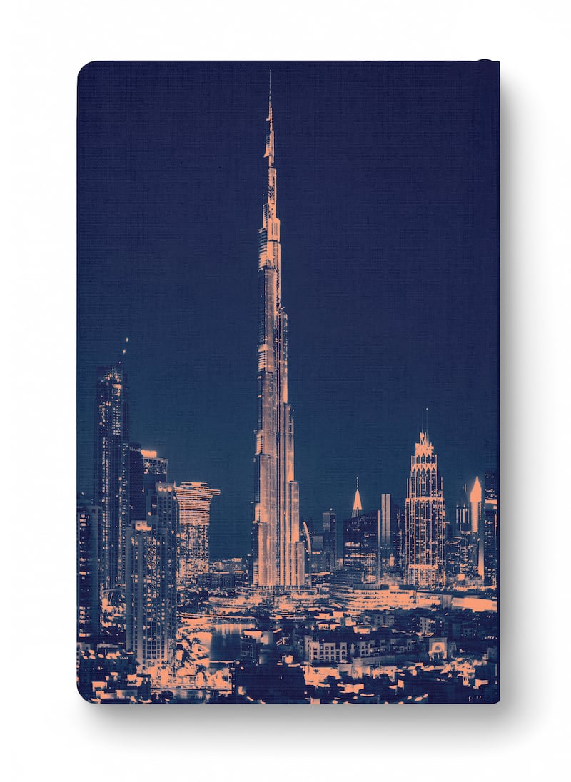 The back cover features a shot of Burj Khalifa