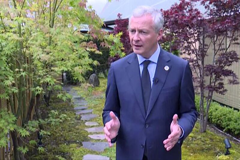 An image grab from an AFP TV video taken on June 8, 2019  shows French Finance minister Bruno Le maire talking on the sidelines of the G20 Finance summit in Fukuoka, Japan.  France is ready to consider cutting its stake in Renault in the interests of consolidating the automaker's alliance with Nissan, Finance Minister Bruno Le Maire tells AFP.  / AFP / Agency pool / Quentin TYBERGHIEN
