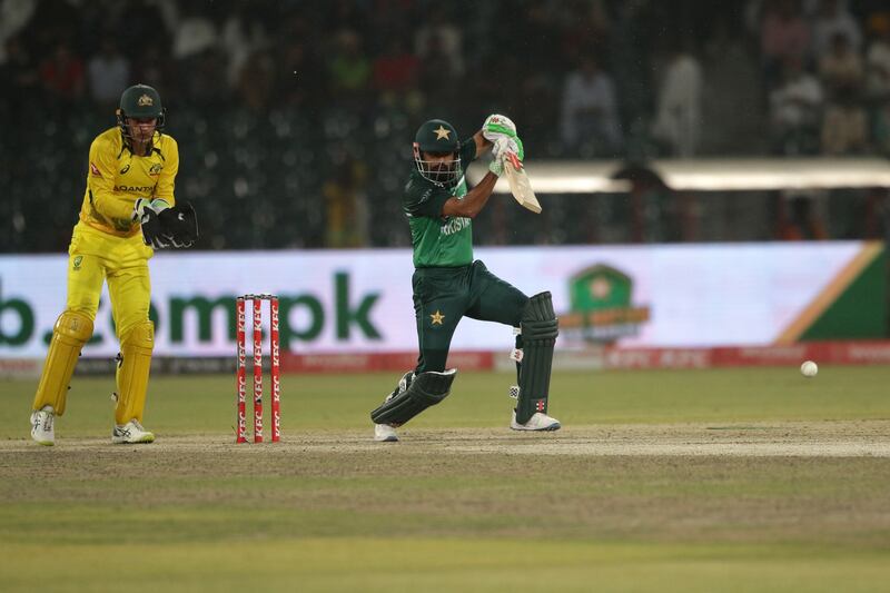 Pakistan's Babar Azam drives the ball on his way to 57. EPA