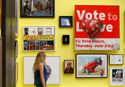 An artwork by artist Banksy entitled Vote to Love is seen amongst other works at the Royal Academy of Arts 250th Summer Exhibition, in London, Britain June 5, 2018. REUTERS/Peter Nicholls  NO RESALES. NO ARCHIVES