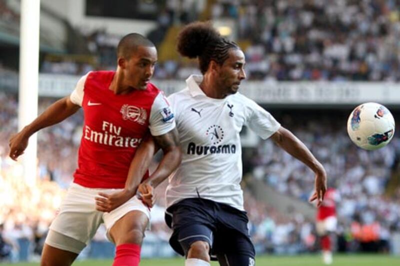 Tottenham’s Benoit Assou-Ekotto, right, is ‘an outstanding left-back’, according to his manager Harry Redknapp.
