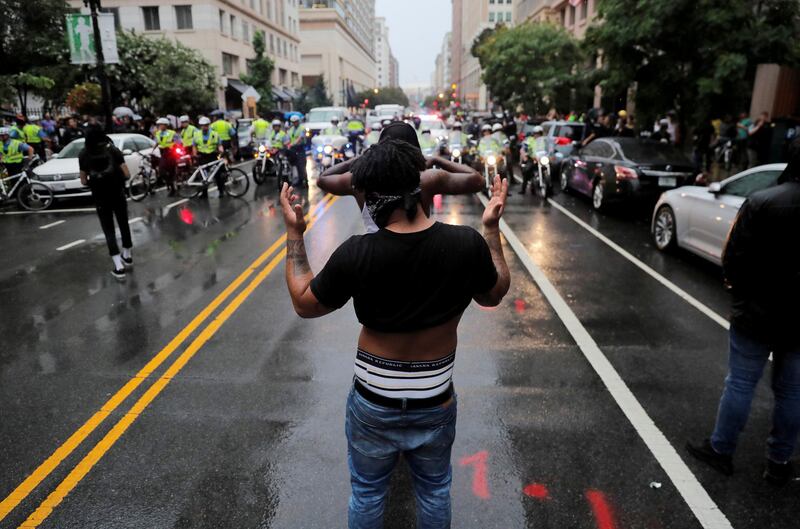 Counter-demonstrators stand in the street during a white nationalist-led rally marking the one year anniversary of the 2017 Charlottesville ‘Unite the Right’ protests, in Washington. Lucas Jackson/Reuters