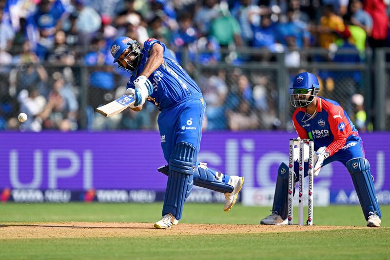 Mumbai Indians' Rohit Sharma hits out on his way to a score of 49 off 27 balls. AFP