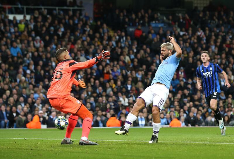 Sergio Aguero scores Manchester City's first goal. Getty Images