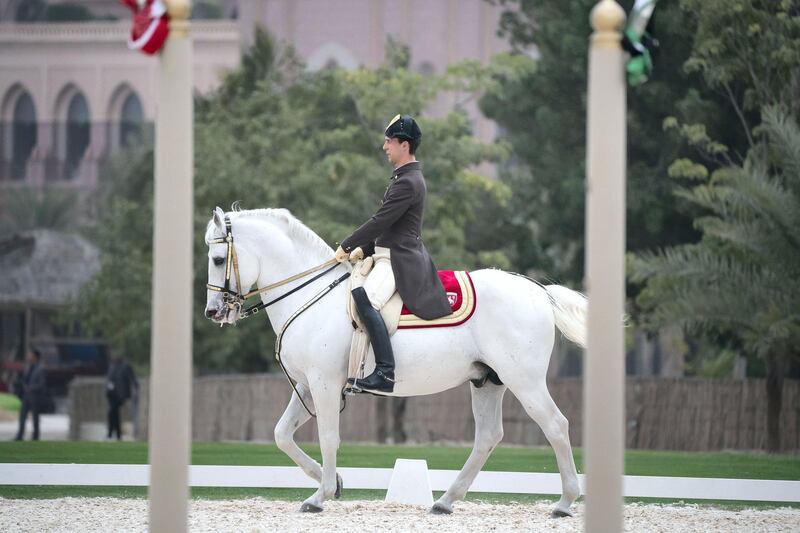 ABU DHABI, UNITED ARAB EMIRATES - March 23, 2019: A rider from the Spanish Riding School of Vienna, performs during a live equestrian show at Emirates Palace.

( Ryan Carter / Ministry of Presidential Affairs )
---