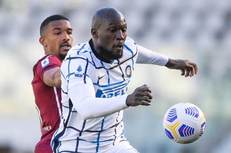 Inter striker Romelu Lukaku under pressure from Torino's Bremer Gleison. AP