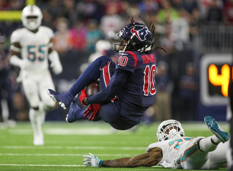 Houston Texans wide receiver DeAndre Hopkins (10) attempts to make a reception during the third quarter against the Miami Dolphins at NRG Stadium. Reuters