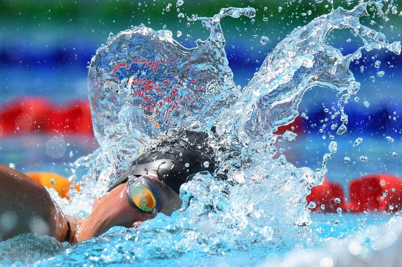 TOPSHOT - Bahamas' Joanna Evans competes during the swimming women's 400m freestyle qualifications during the 2018 Gold Coast Commonwealth Games at the Optus Aquatic Centre in the Gold Coast on April 10, 2018 / AFP PHOTO / MANAN VATSYAYANA