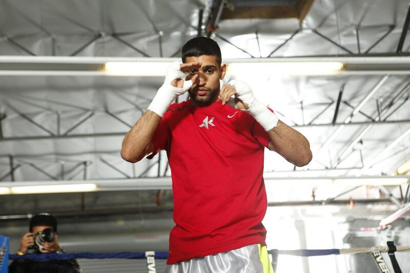 Amir Khan in action during a workout session at Virgil Hunter’s Gym on April 24, 2014 in Hayward, California. Kahn is preparing to take on Luis Collazo at the MGM Grand in Las Vegas on May 3, 2014. Alexis Cuarezma/Getty Images/AFP