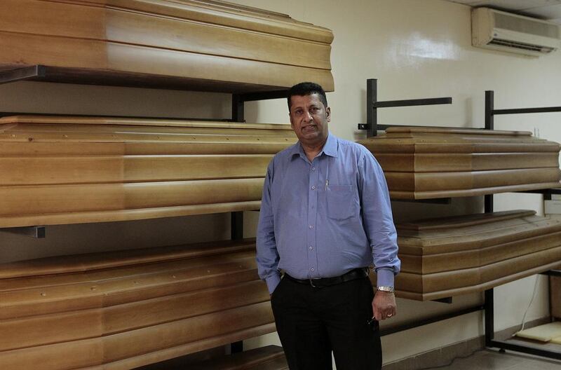 John Korah, Managing Director of Grafco, takes care of cadavers in coffins to be ship out or airlifted to any country of origin. Jeffrey E Biteng / The National