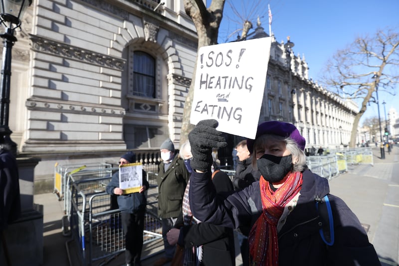 Members of the National Pensioners Convention demonstrate near Downing Street in London, against the rise in fuel and energy prices in the UK. PA