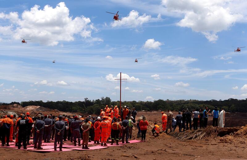 Rescue workers attend a mass for victims of a collapsed tailings dam owned by Brazilian mining company Vale SA, in Brumadinho, Brazil February 1, 2019. REUTERS/Adriano Machado     TPX IMAGES OF THE DAY