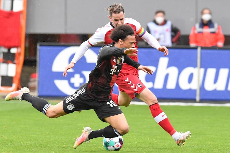 Bayern's Leroy Sane is brought down by Freiburg defender Christian Gunter. AFP