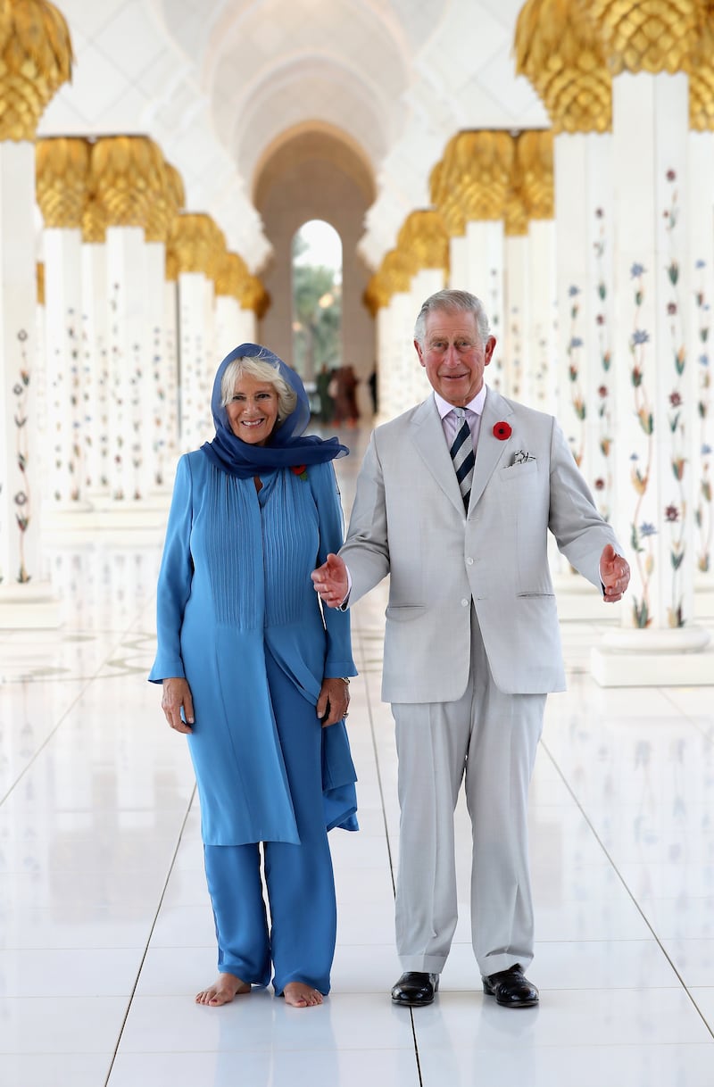 Prince Charles and Camilla smile during a visit to Sheikh Zayed Grand Mosque in Abu Dhabi on the first day of a royal tour of the UAE in 2016.