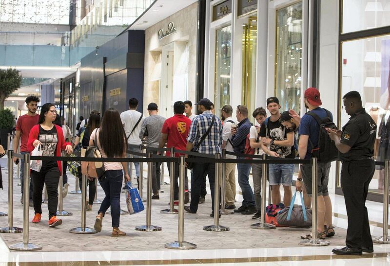 DUBAI, UNITED ARAB EMIRATES, 20 SEPTEMBER 2018 - Crowd waiting in queue to get the new iphone XS at Apple store in Dubai Mall.  Leslie Pableo for The National for Patrick Ryan’s story