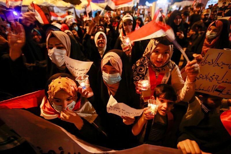 Iraqi women take part at an anti-government protest in the holy city of Najaf, Iraq. Reuters