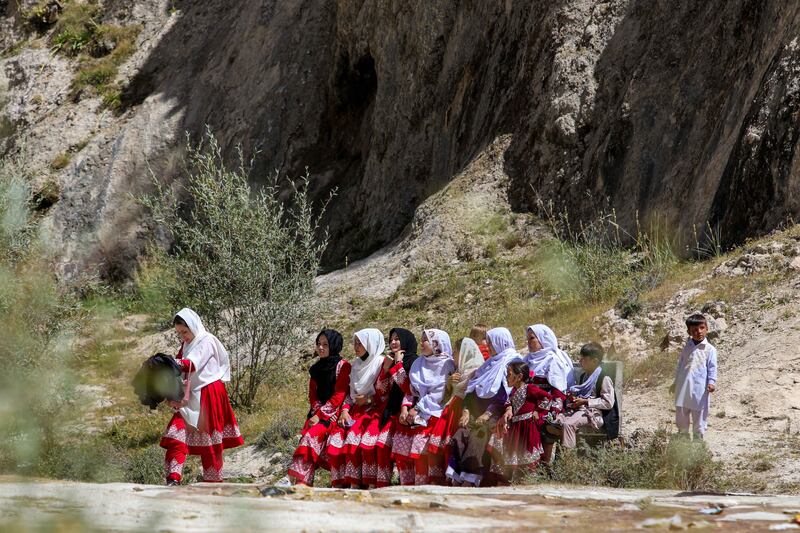 Women walk through Band-e-Amir national park in Afghanistan in defiance of a ban imposed by the Taliban. All photos: EPA