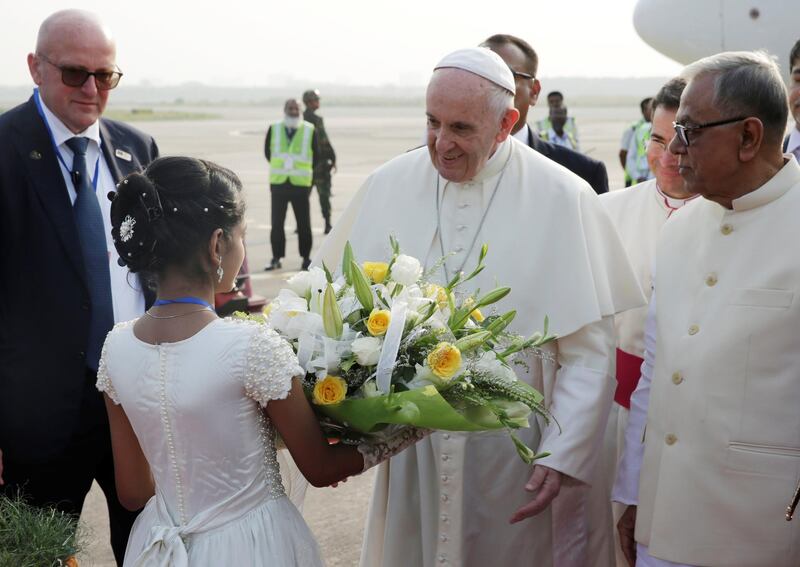 Pope Francis is welcomed after arriving in Bangladesh. Max Rossi / Reuters