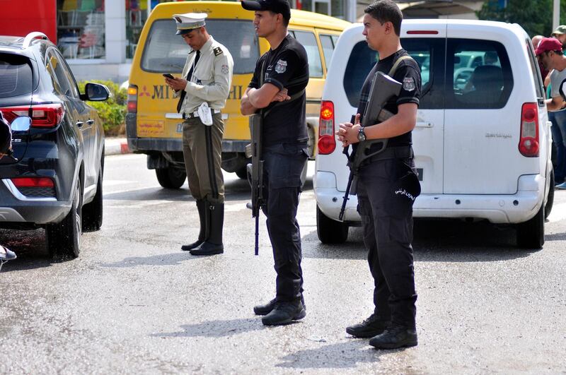 Policemen secure the site of an attack on Tunisian National Guard officers in Sousse, south of Tunis,Tunisia.  EPA