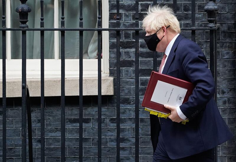 Prime Minister Boris Johnson leaves 10 Downing Street in central London. AFP