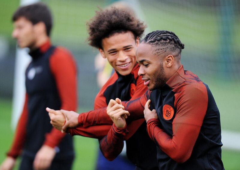 Raheem Sterling, right, is in direct competition for a place in the Manchester City team with new signing Leroy Sane. Peter Powell / EPA