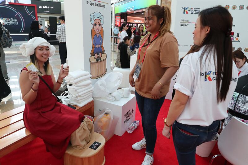 Visitors to the K-spa stand