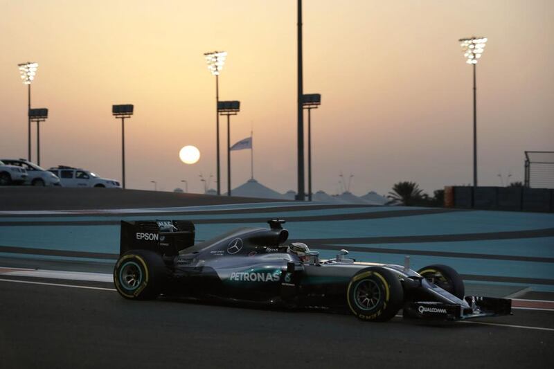 Lewis Hamilton drives into the sunset in Abu Dhabi in the lead. Hassan Ammar / AP Photo