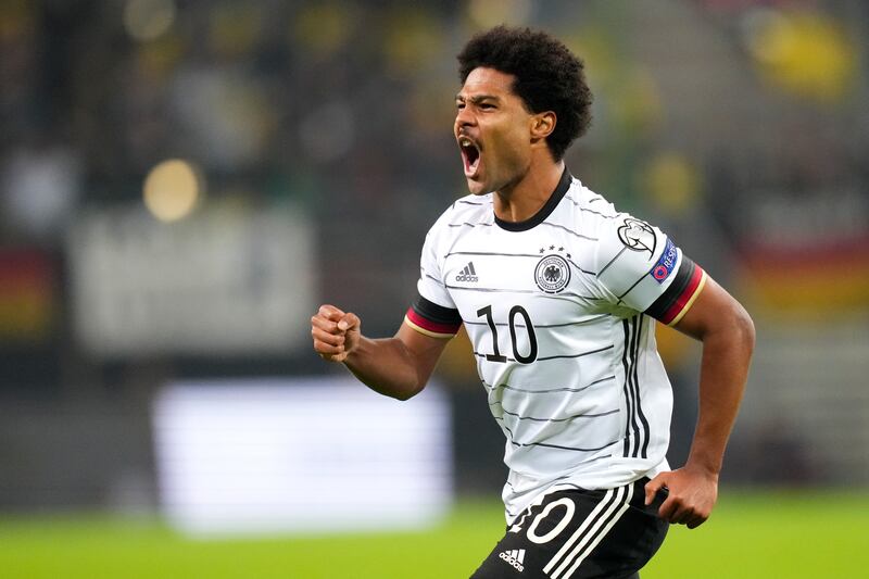 Serge Gnabry celebrates after levelling the scores. AP