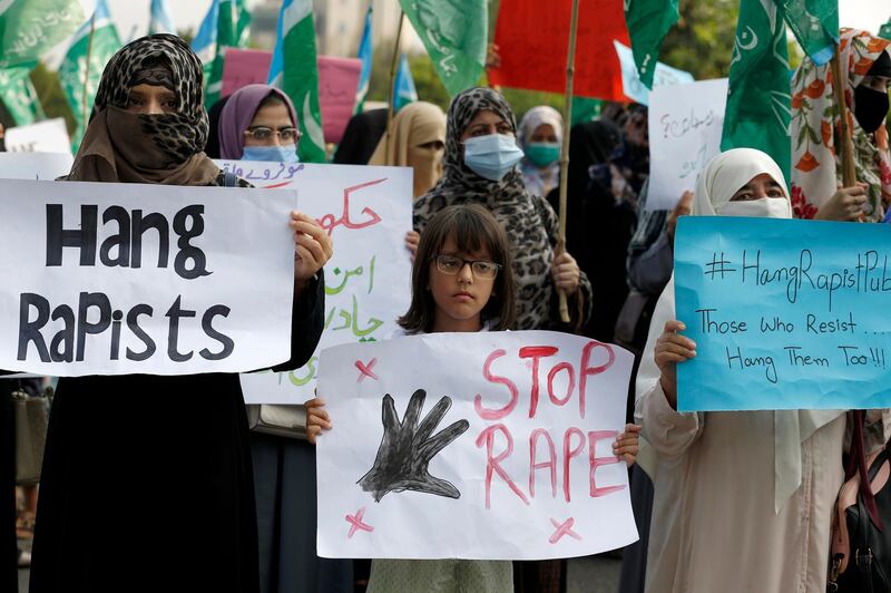 Supporters of the religious group 'Jamaat-e-Islami participate in a demonstration to condemn the incident of rape on a deserted highway, in Islamabad, Pakistan, Friday, Sept. 11, 2020. Pakistani police said they detained 15 people for questioning after two armed men allegedly gang raped a woman in front of her children after her car broke down on a deserted highway near the eastern city of Lahore. (AP Photo/Anjum Naveed)